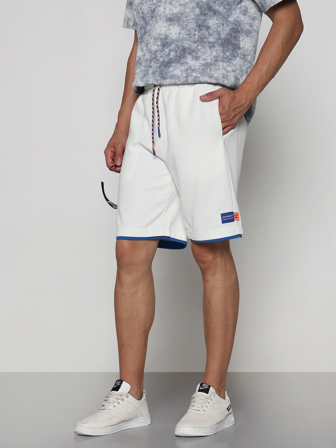 Men's White Athleisure Relaxed Fit Shorts with Blue Rib